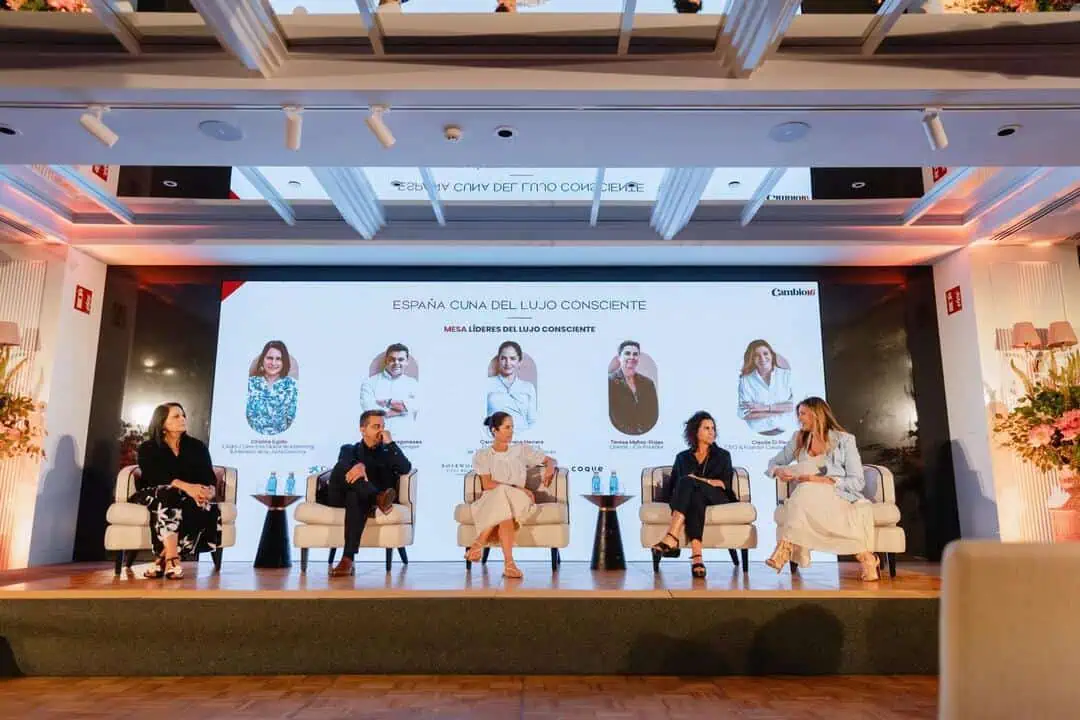 panel of industry leaders discussing conscious luxury and sustainability at the spain cradle of conscious luxury event in Madrid with ark architects participation.