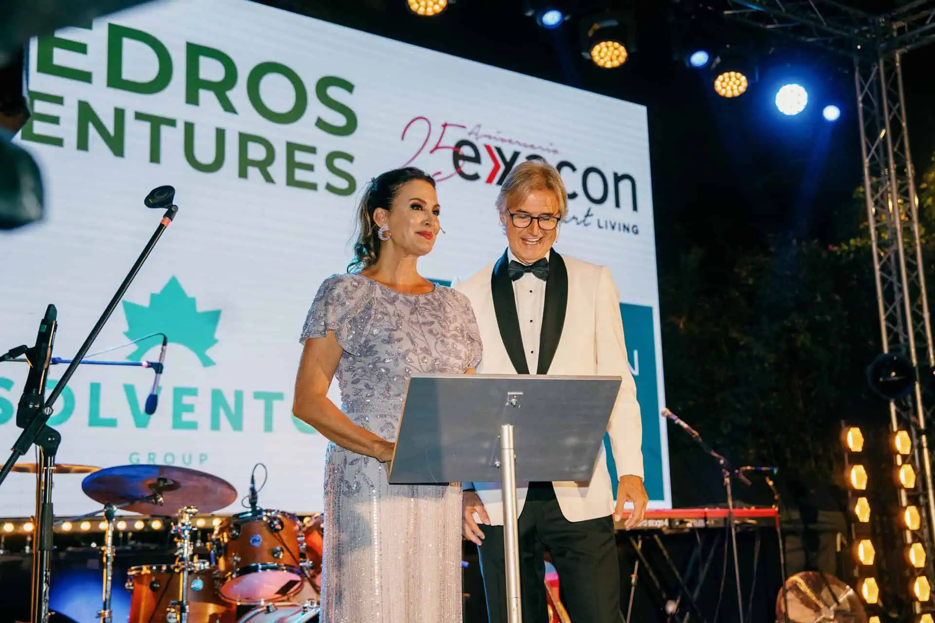 Presenters at AECC Marbella 40th Anniversary Gala event podium