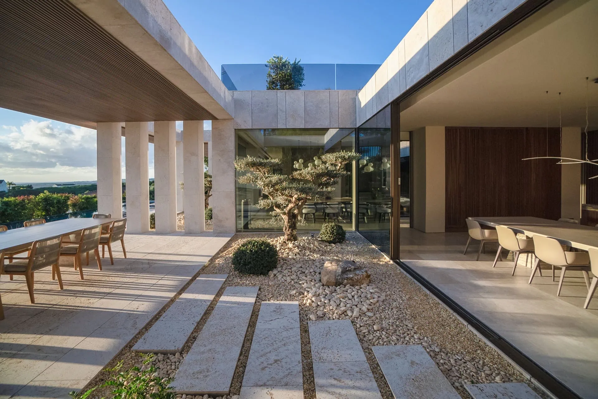 Contemporary TAI villa by ARK Architects with infinity pool and open-plan terraces in Sotogrande